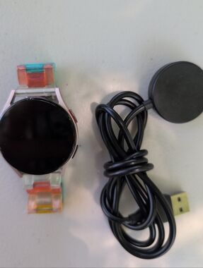 Samsung Galaxy Watch 5 with Multiple Bands and Charger